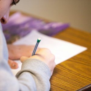 person using pencil